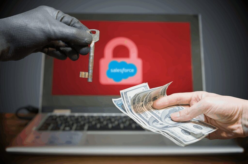 Gloved hand offering key for cash before locked laptop