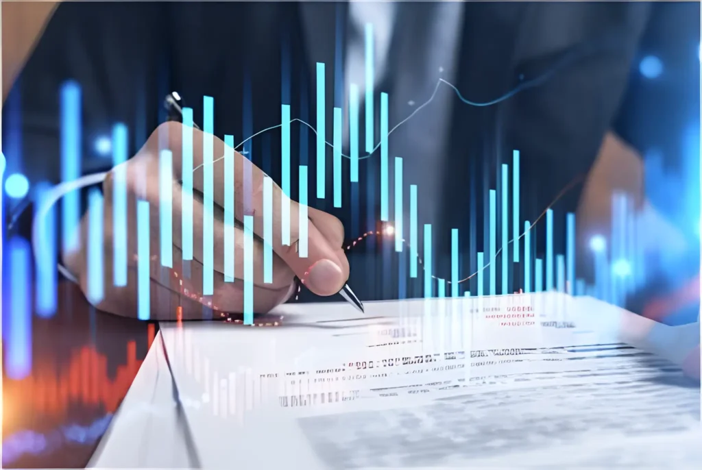 Hand signing document with financial growth chart overlay